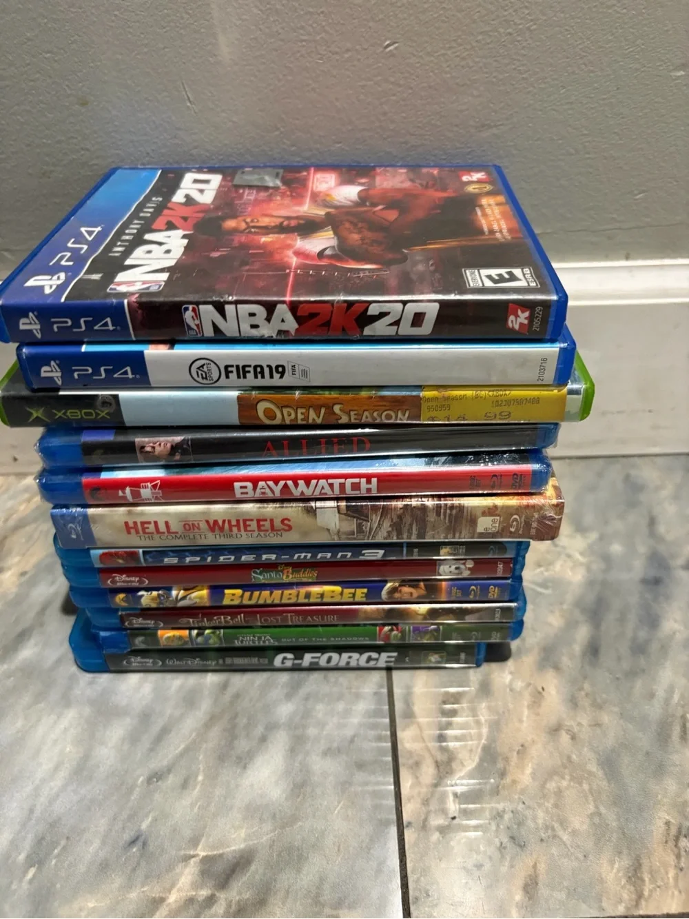 Stack of Mixed Blu-ray & PS4 Games - Assorted Titles in Blue Cases